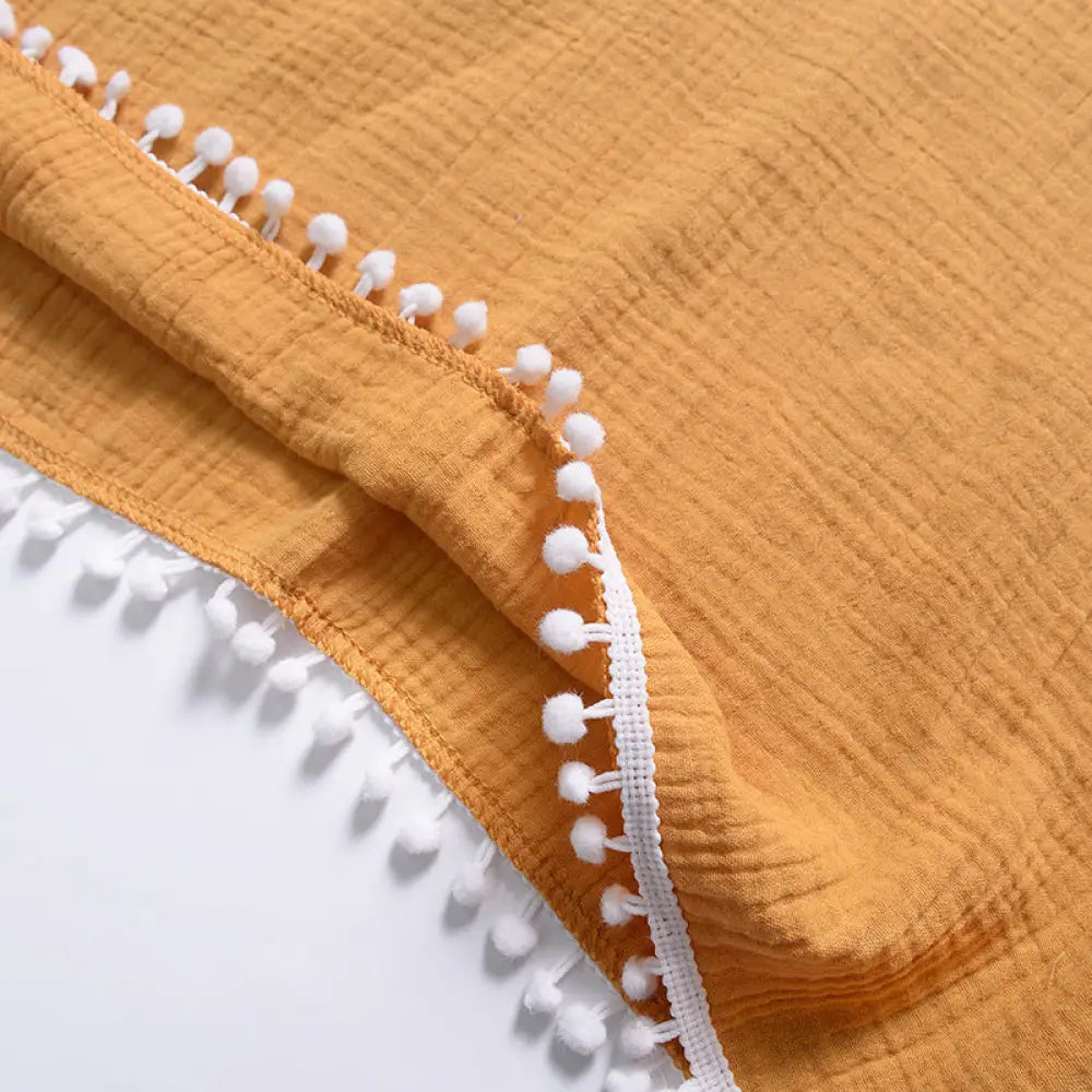 Poncho a capuche enfant
